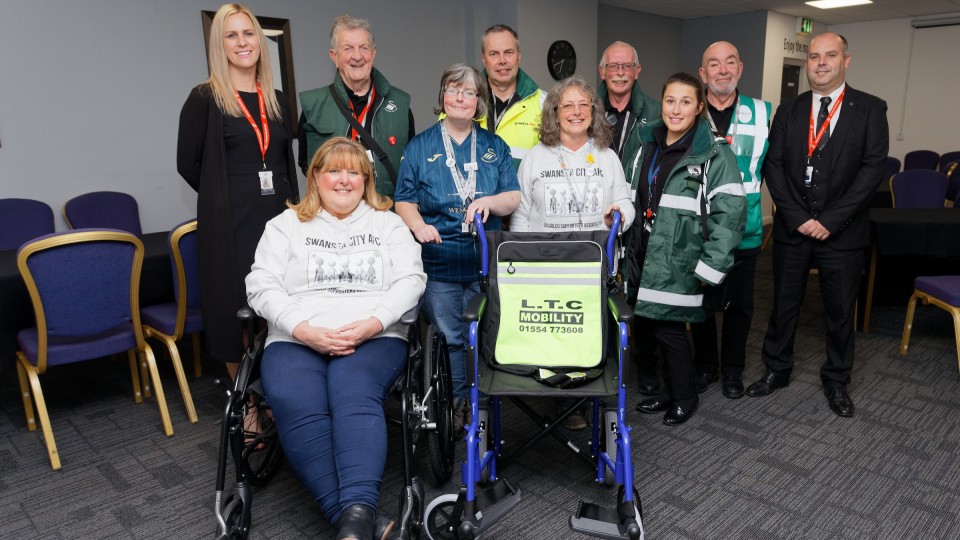Swansea City DSA donate wheelchair to help fans attend the